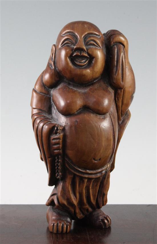 A Chinese boxwood carving of Budai, 22cm